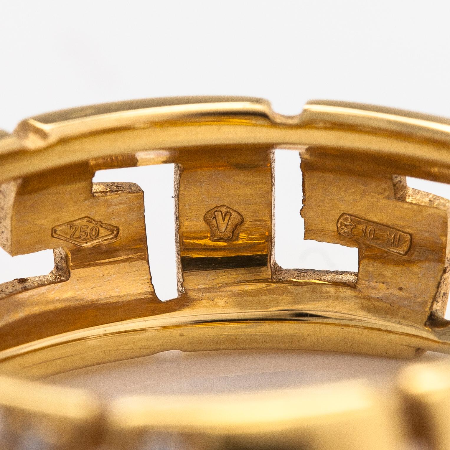 Versace, An 18K gold ring with diamonds ca. 0.12 ct in total. Marked Versace.