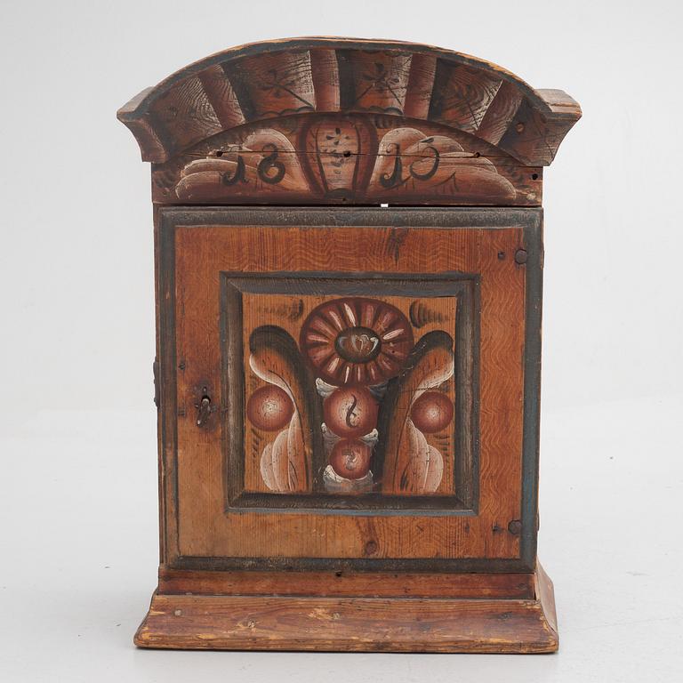 A Swedish wall cabinet, Rättvik, Dalarna, dated 1815.