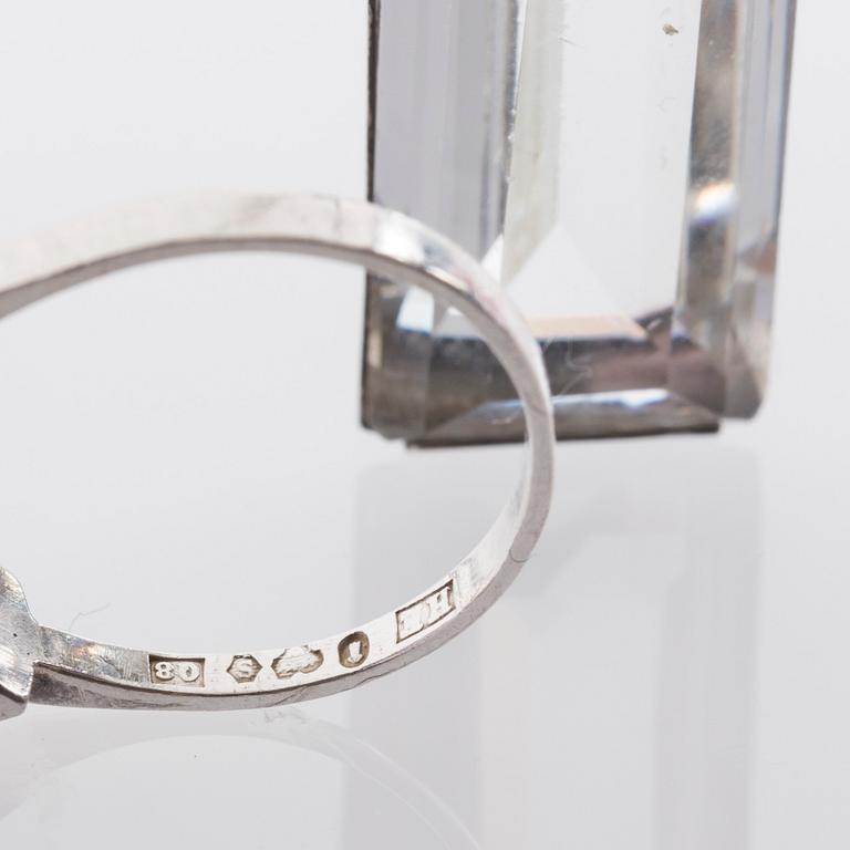 HÄNGE SAMT RING, sterlingsilver med bergkristall. Stigbert för Heribert Engelbert samt Wahlberg.