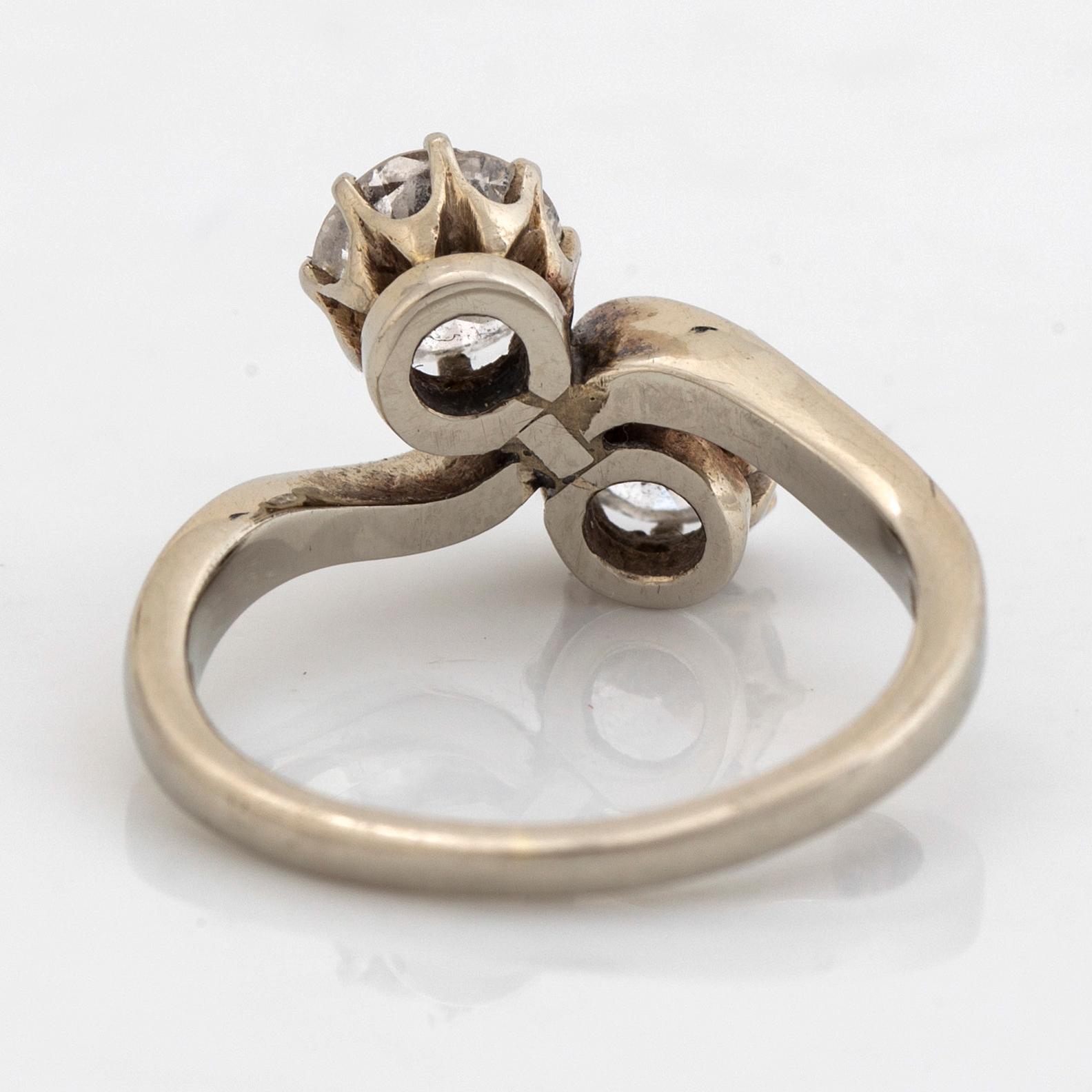 Old cut diamond 'toi et moi' ring.