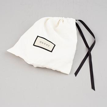 Gucci, a white leather belt, size 90 36.