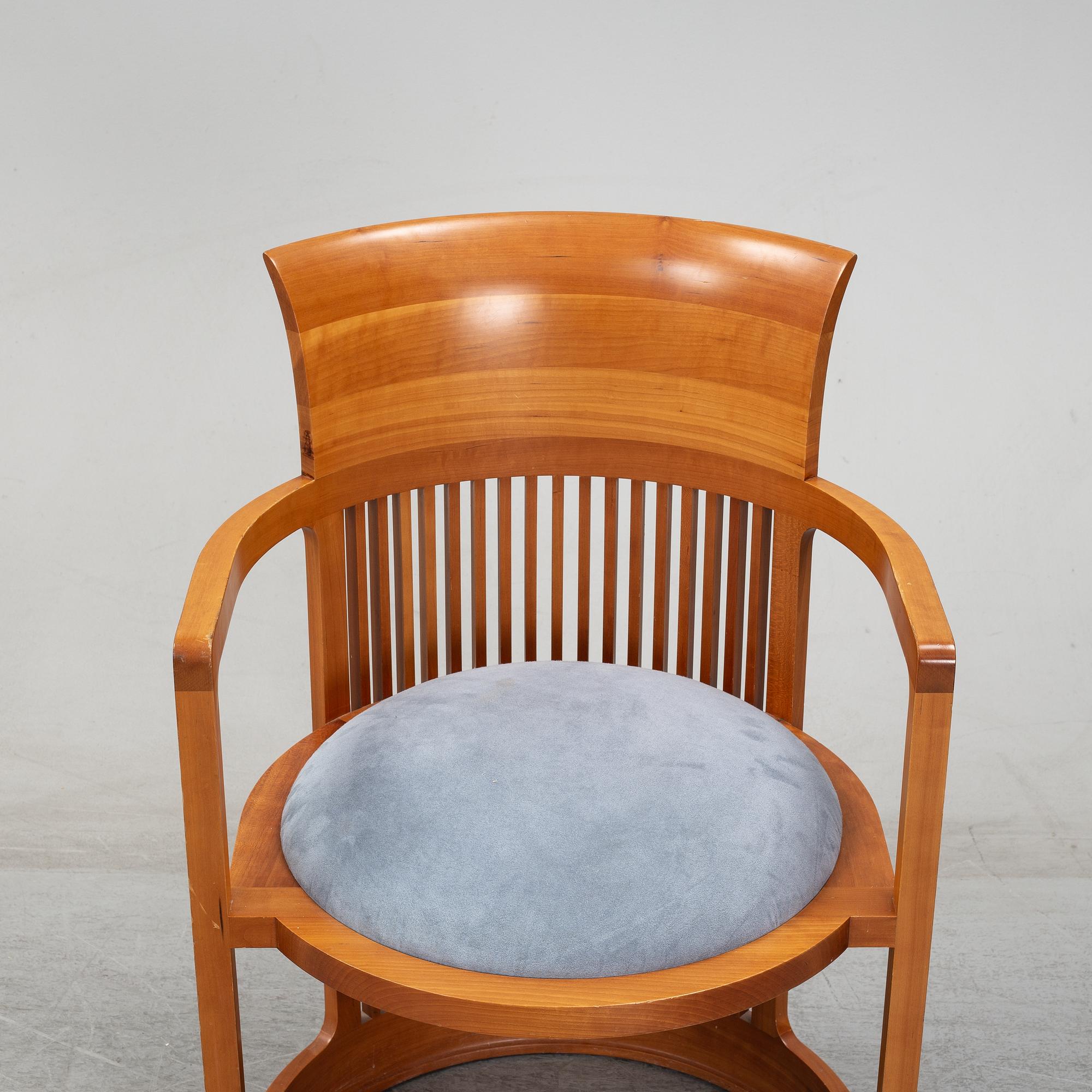 A model 606 'Barrel' chair by Frank Lloyd Wright for Cassina, designed 1937.