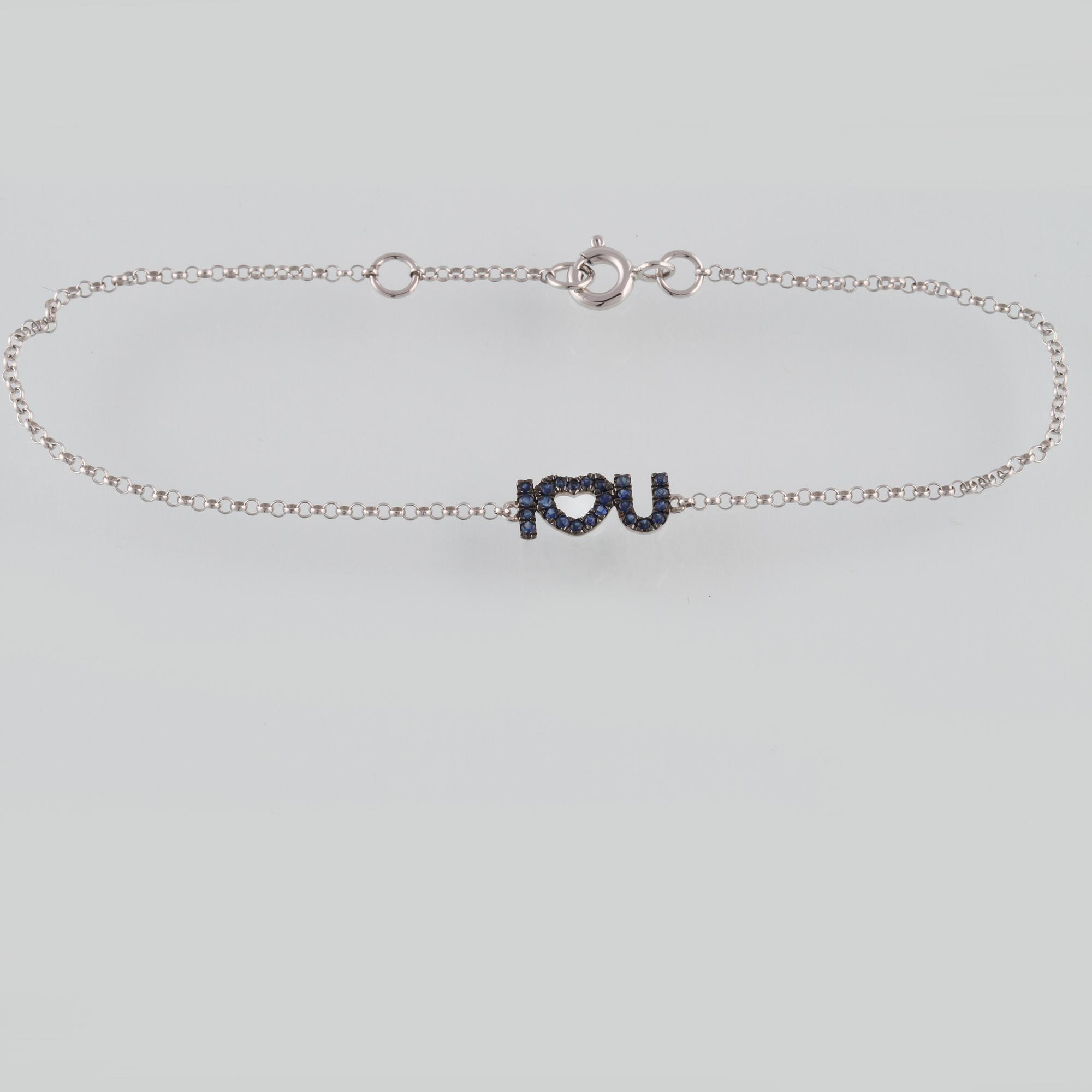 ARMBAND, 18K vitguld med fasettslipade blå safirer. Vikt 1,1 gram.