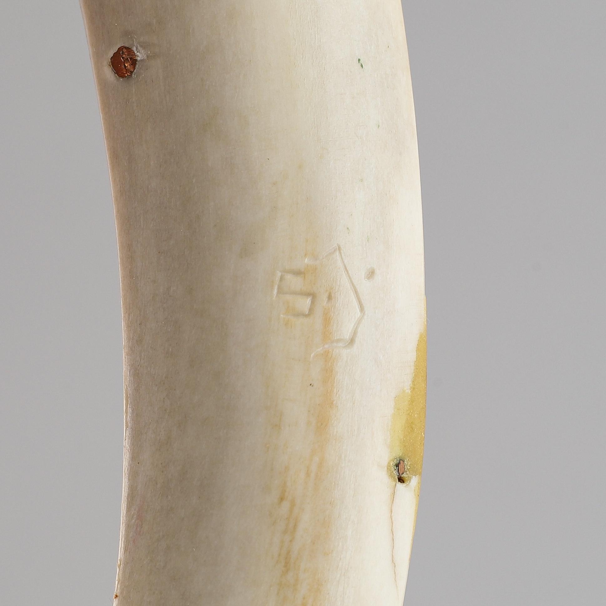 A reindeer horn Sami knife, signed SJ.
