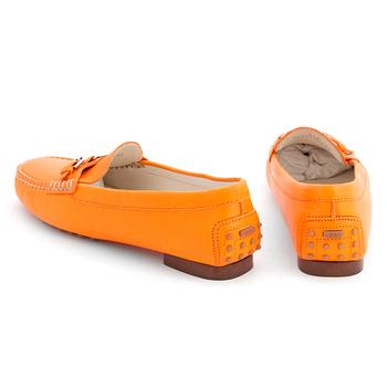 RALPH LAUREN, a pair of orange leather loafers. Size US 8 1/2B.