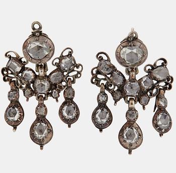 1031. A pair of 18th century rose- and table-cut diamond earrings.