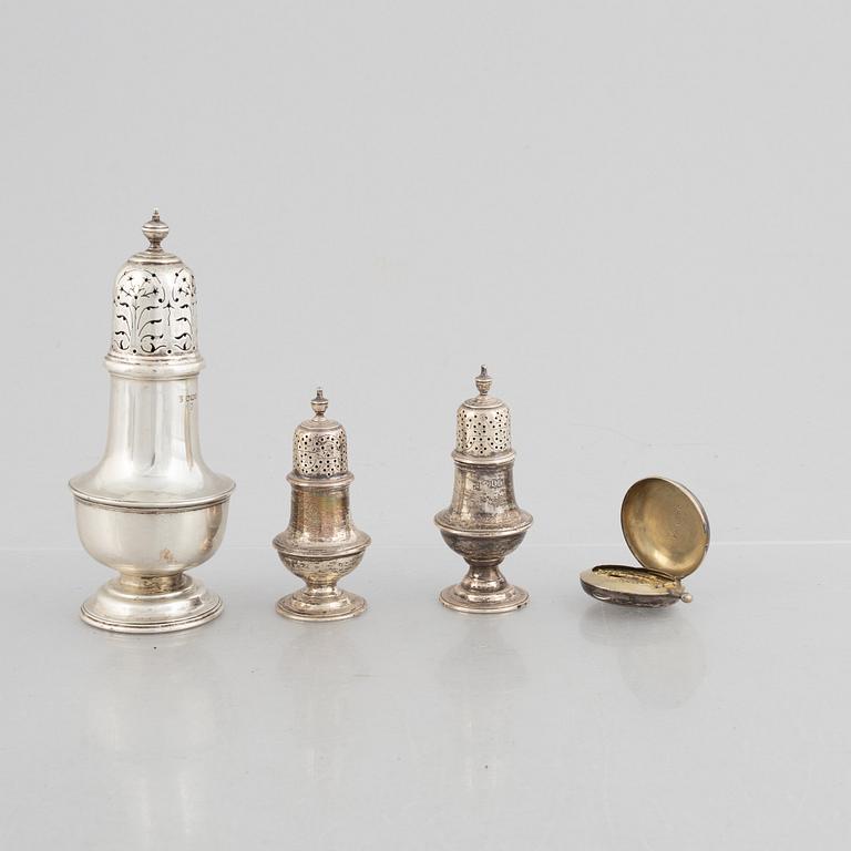 A sugar caster, a salt and pepper shaker, and a snuff-box, silver, including Daniel & John Wellby, London, England 1905.