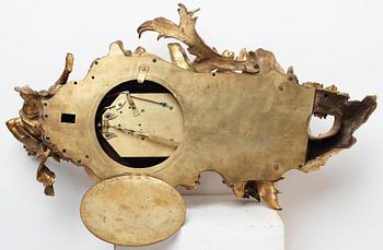 A Louis XV mid 18th century gilt bronze wall clock marked "Caffieri fecit".