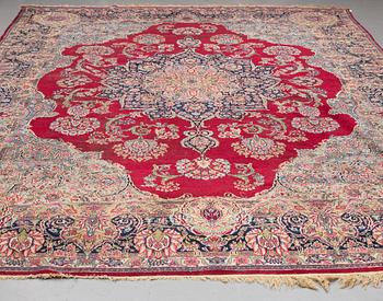 A CARPET, , semi-antique Kerman, ca 431 x 296 cm.
