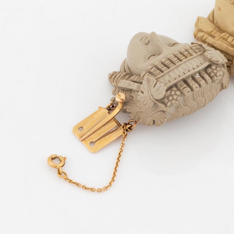 A lava cameo bracelet.