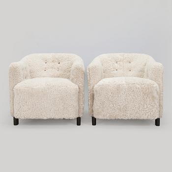 A pair of  1930s/40s. 'Continent' armchairs model 217, Asko, Finland.