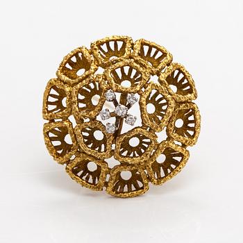 Brosch, 18K guld och diamanter ca 0.16 ct totalt.