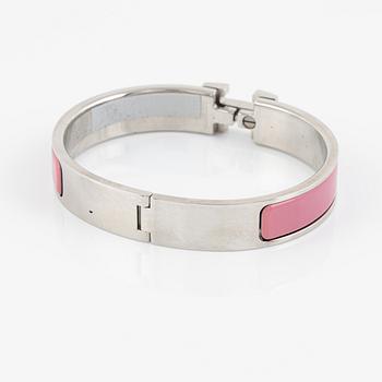 Hermès, a 'Clic H' bracelet.