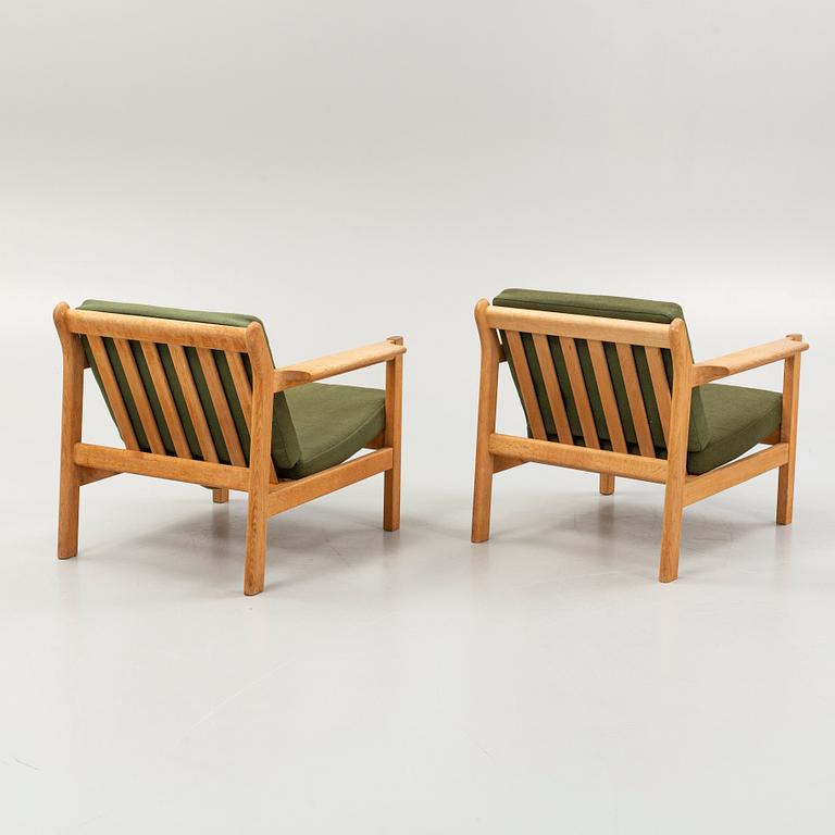 Børge Mogensen, armchairs, model 22, and a footstool, Fredericia Furniture Factory, Denmark.
