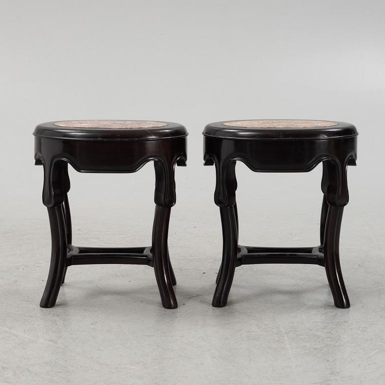 A pair of black-lacquered stools, Japan, around 1900.