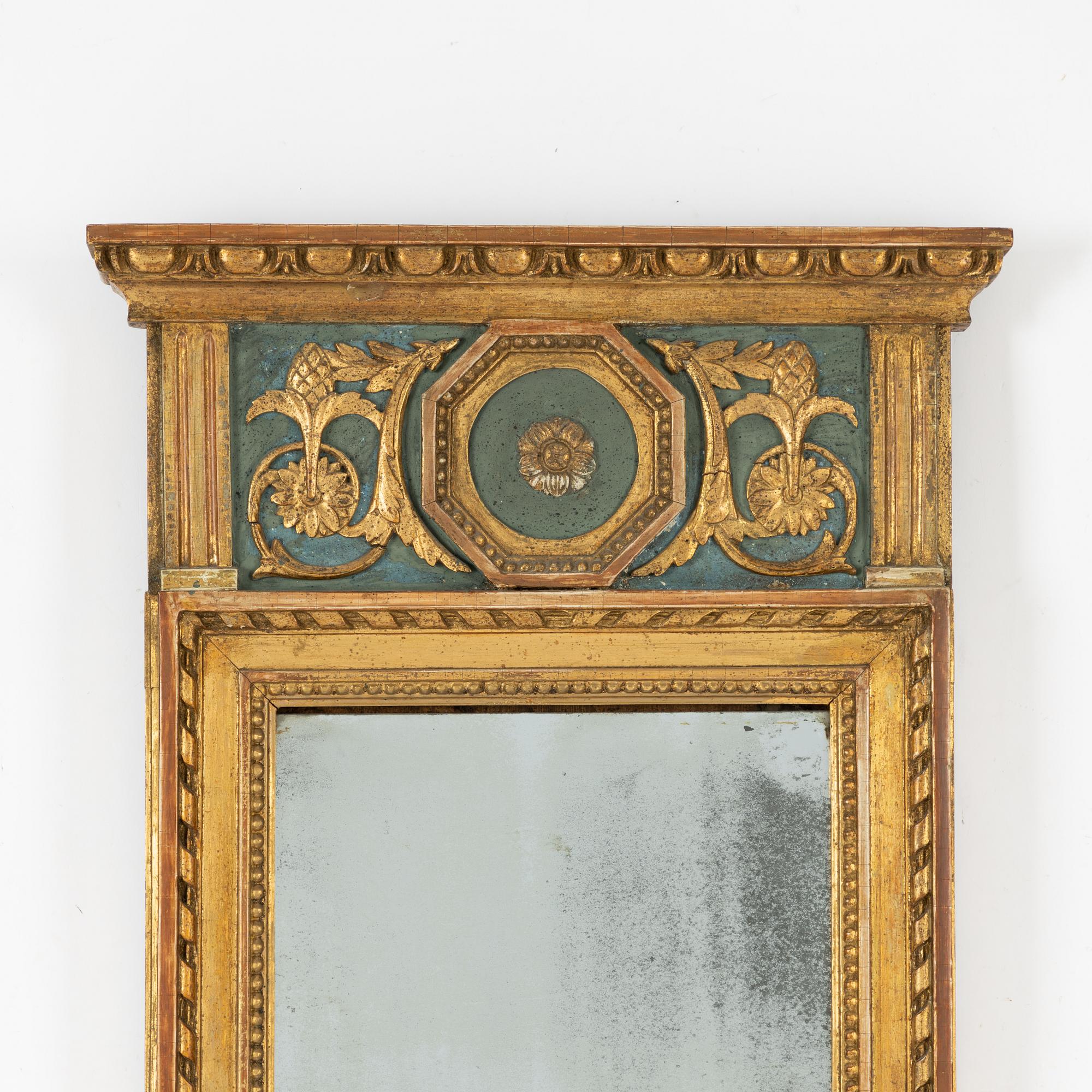 A late Gustavian mirror, circa 1800.