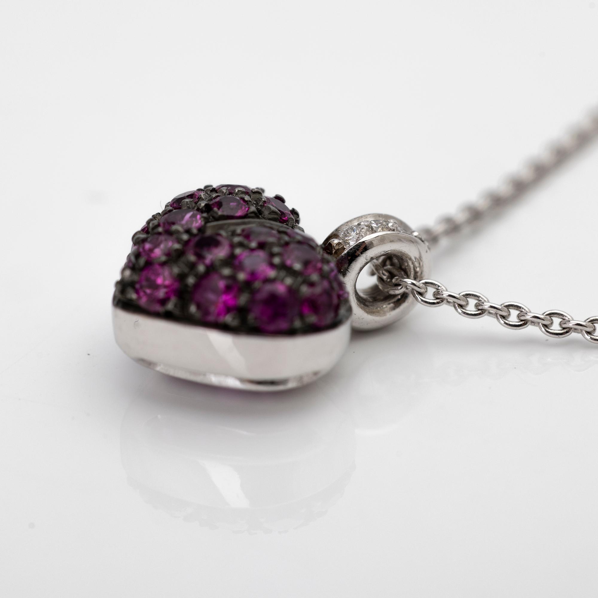 Necklace, 18K white gold, with a heart-shaped pendant in black rhodium-plated white gold set with rubies and brilliant-cut diamonds.