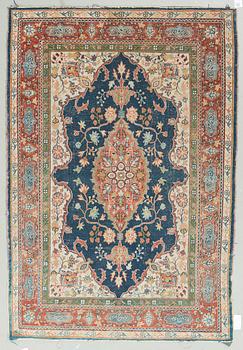 A semi-antique rug from Tabriz 200 x 133.