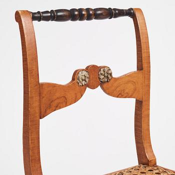 An Empire chair, first half of the 19th century.