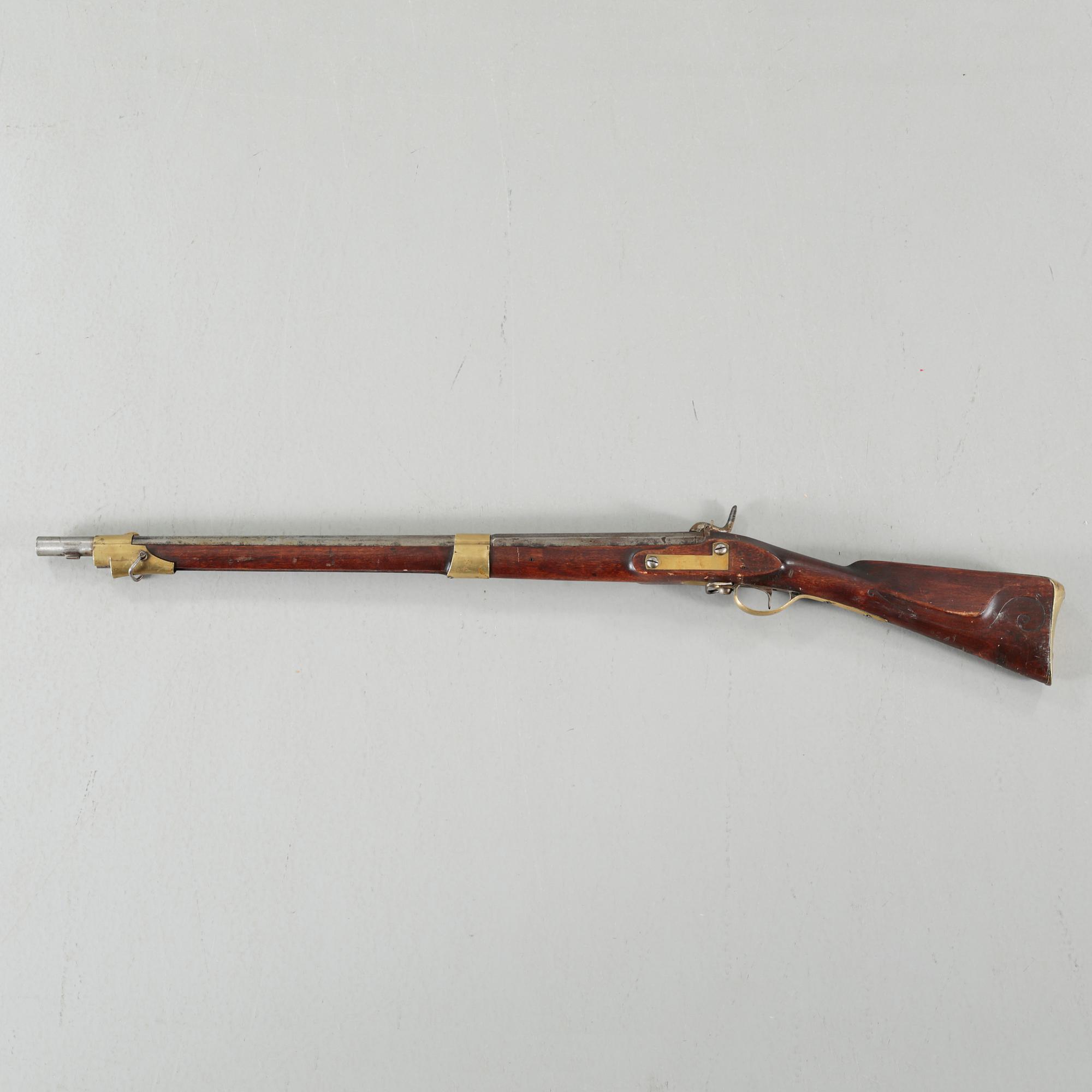 A percussion rifle, remade from flintlock rifle m/1820.