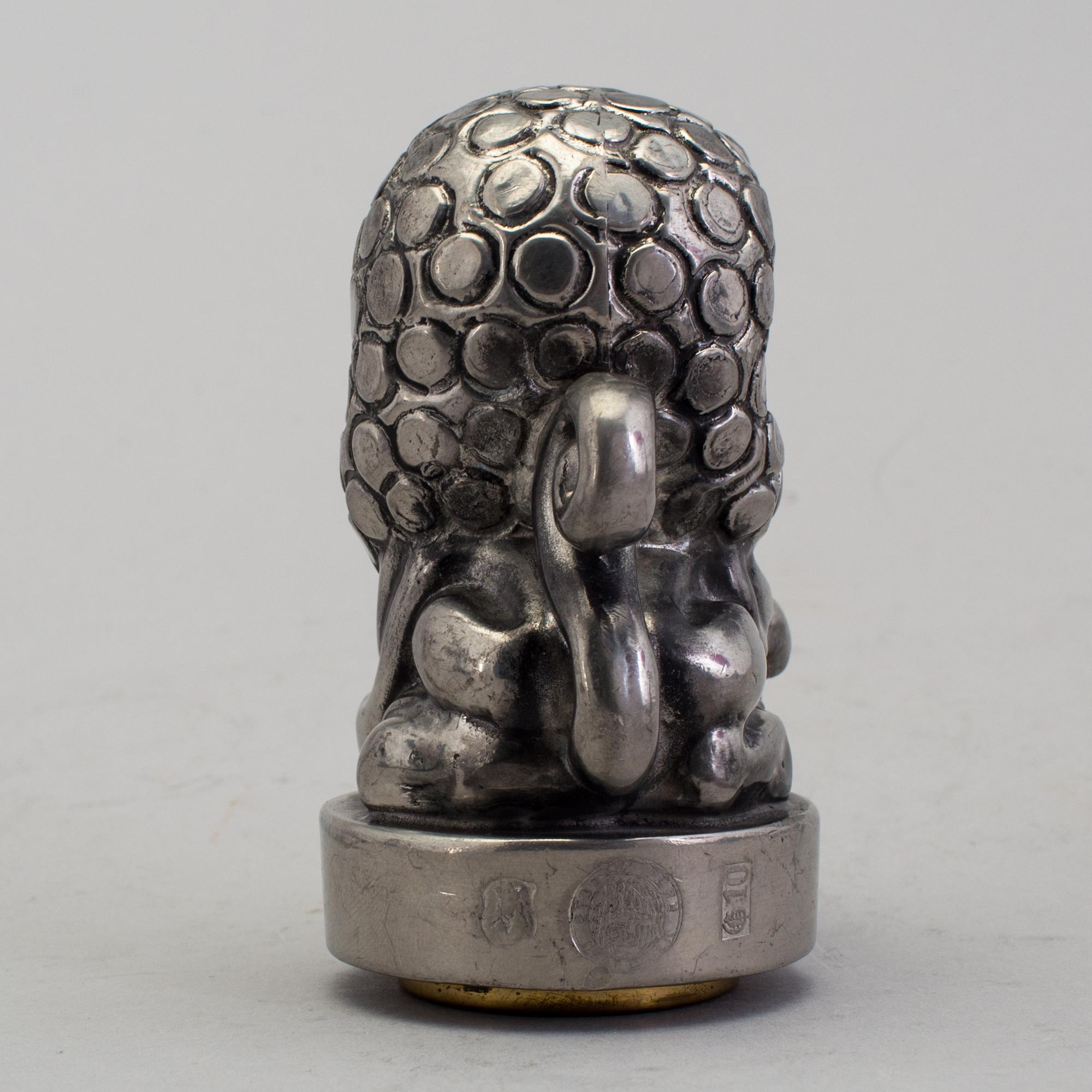 ANNA PETRUS, seal stamp with a brass stamp, pewter and brass, Svenskt Tenn, 1981 (year mark blurred).