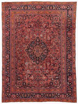 An oriental carpet, c. 401 x 295 cm.