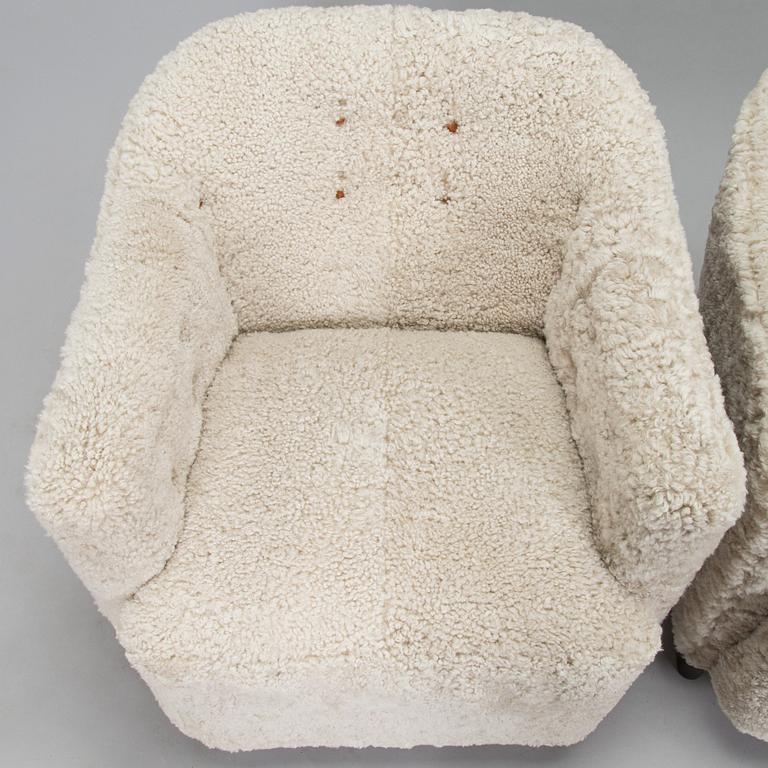 A pair of  1930s/40s. 'Continent' armchairs model 217, Asko, Finland.