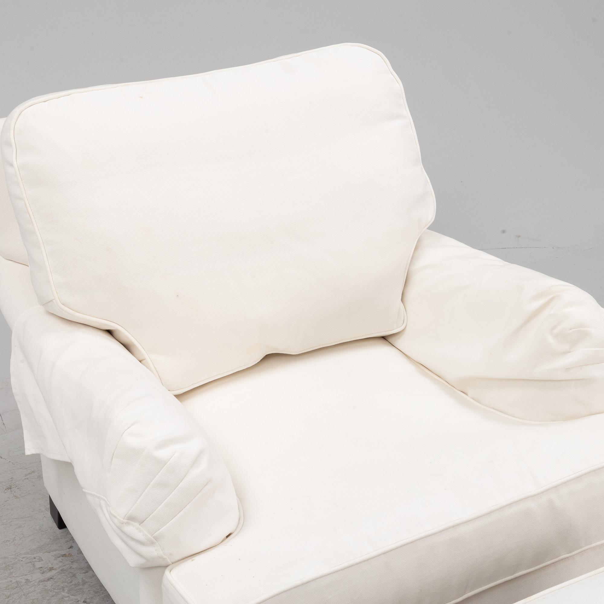 An easy chair with ottoman from Englesson, 21st century.