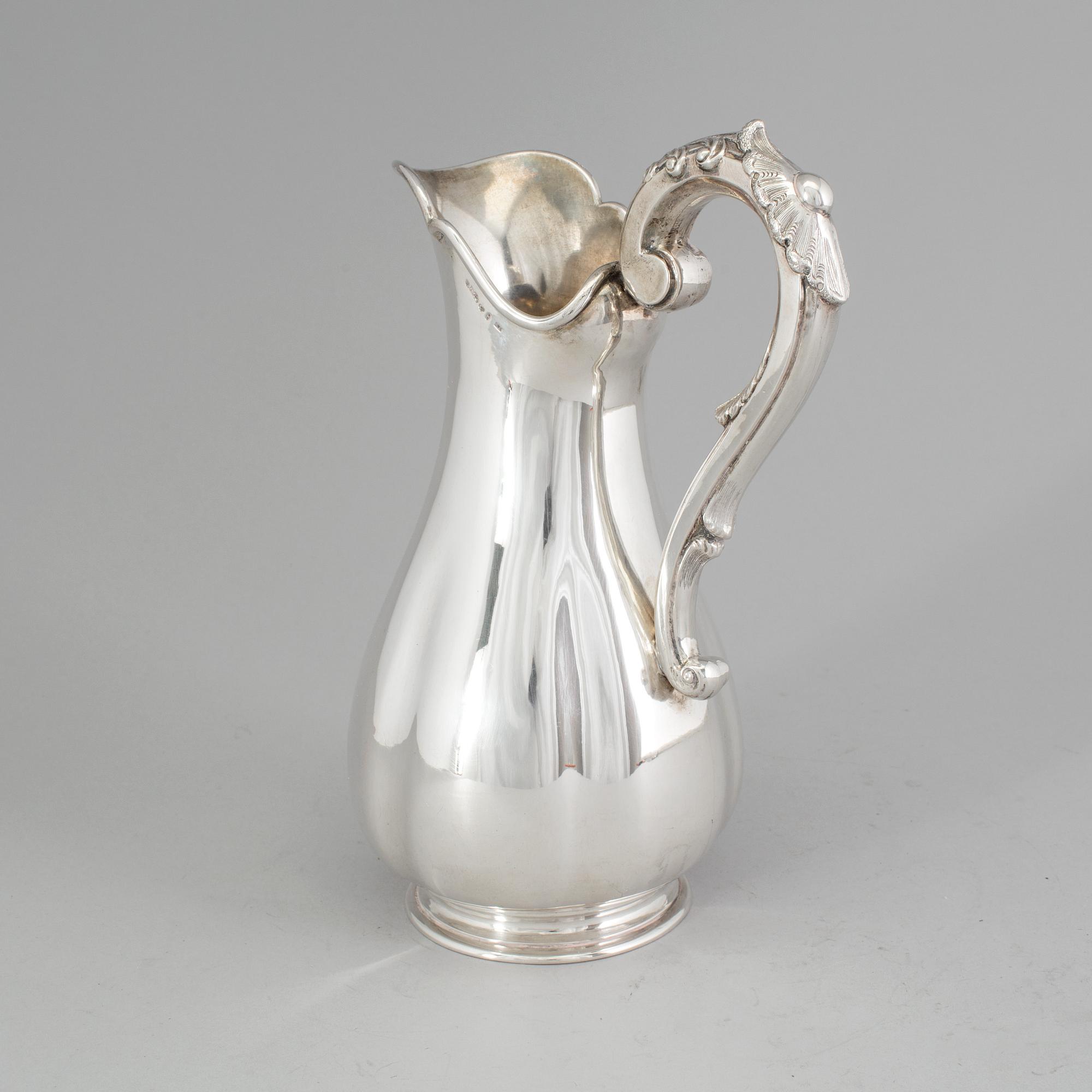 A Swedish silver water pitcher, maker's mark Gustaf Theodor Folcker, Stockholm, 1860. Weight 647 g.
