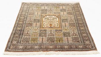 A carpet, oriental silk, circa 145 x 97 cm.