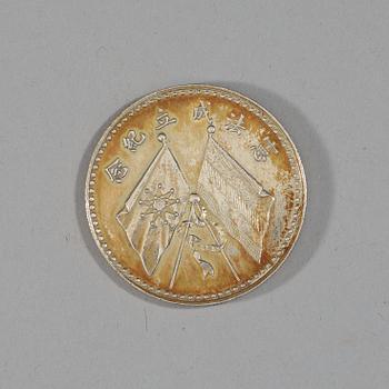 A box with five silver coins, Republic, early 20th Century.