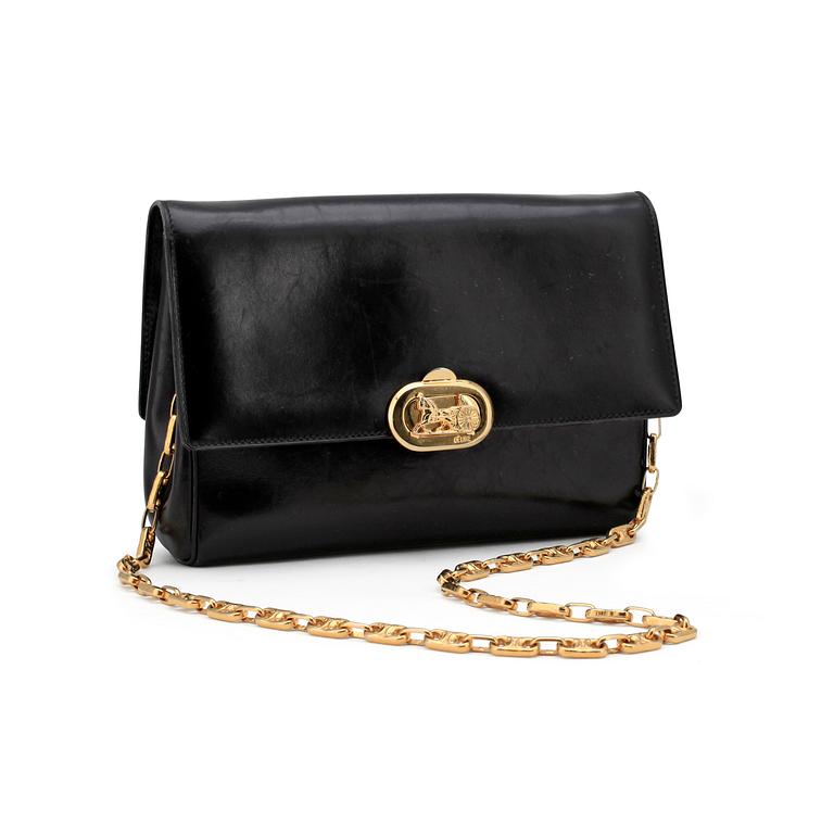 CÉLINE, a black leather evening bag.