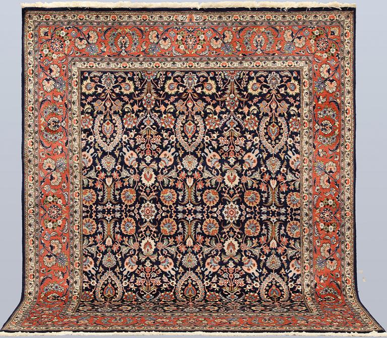 A part silk Sarouk rug, signed, approx. 240 x 208 cm.