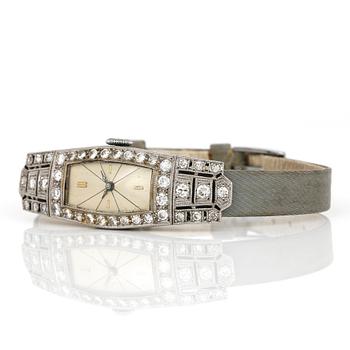 ARMBANDSUR, dam, platina med små diamanter, tot ca 1,08 ct.