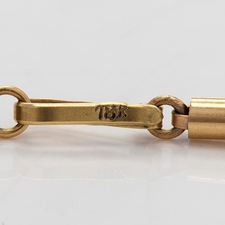 A 16K gold necklace with garnets.