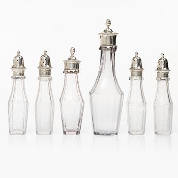 Parts for a table centrepiece, six glass bottles, and seven lids in silver, marked Pehr Zethelius, Stockholm 1807.