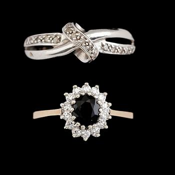 RINGAR, 2 st, 9 k vit- och rödguld med diamanter och blå sten. Total vikt ca 4 gram.