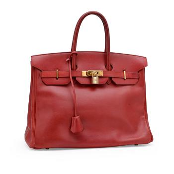 838. HERMÈS, a raspberry red leather "Birkin 35" bag.