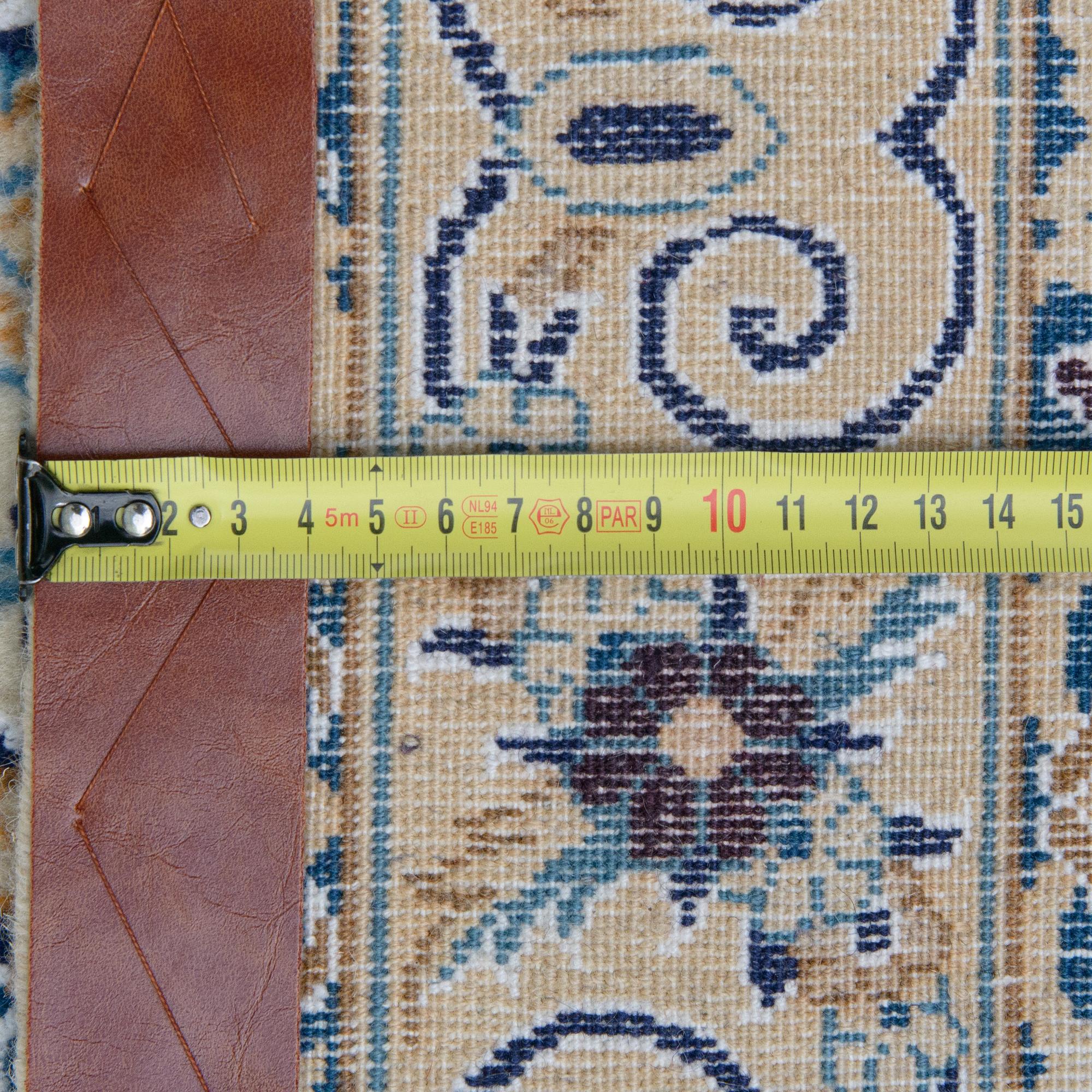 A carpet, Nain, part silk, 9 LAA, ca  577 x 380 cm.