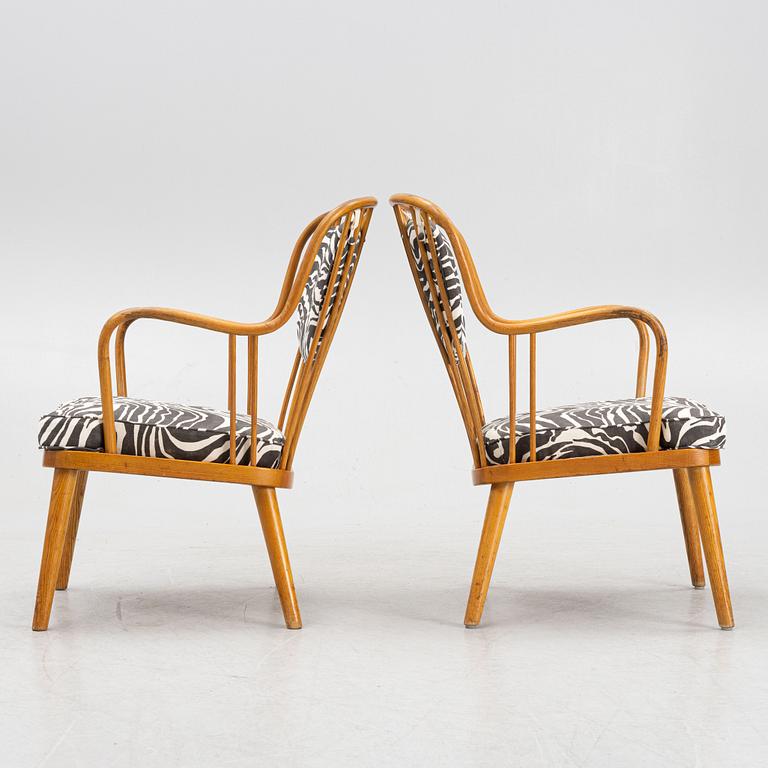 Aage Herman Olsen, a pair of model '1774' chairs, Kocks Snickerifabrik, Sweden, mid 20th Century.