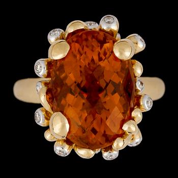 A citrine and brilliant cut diamond ring, tot. app. 0.18 cts.
