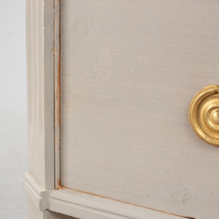 A Gustavian style chest of drawers, mid 20th century.