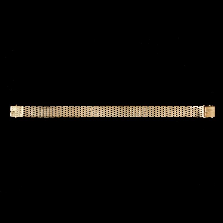 ARMBAND, 18 k guld, 1962. Vikt ca 33 g.