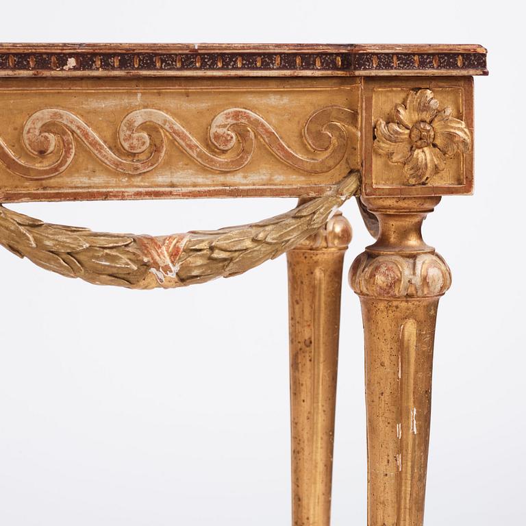 A Gustavian giltwood and faux-porphyry console table, late 18th century.