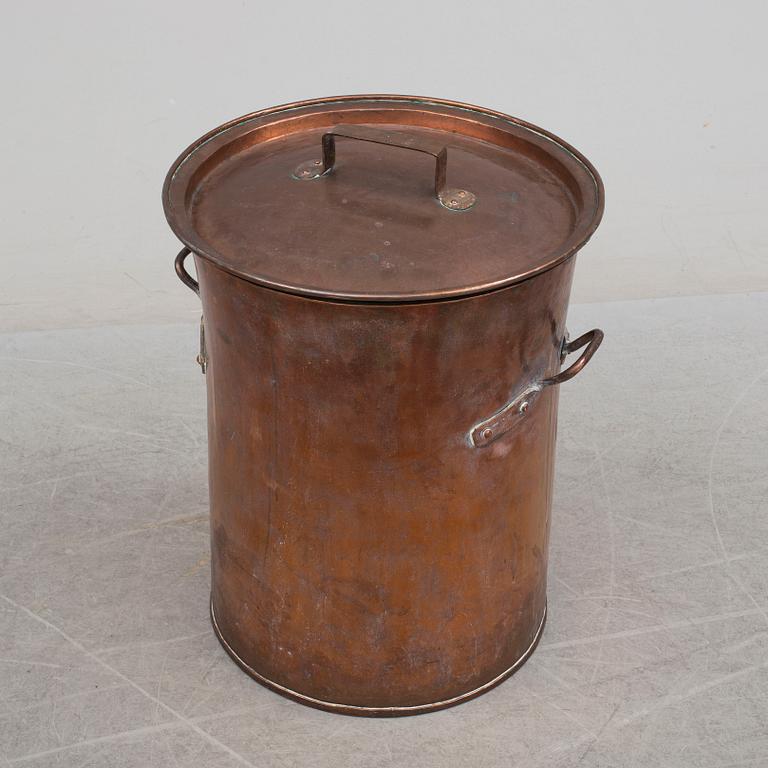 A late 19th century copper barrel.