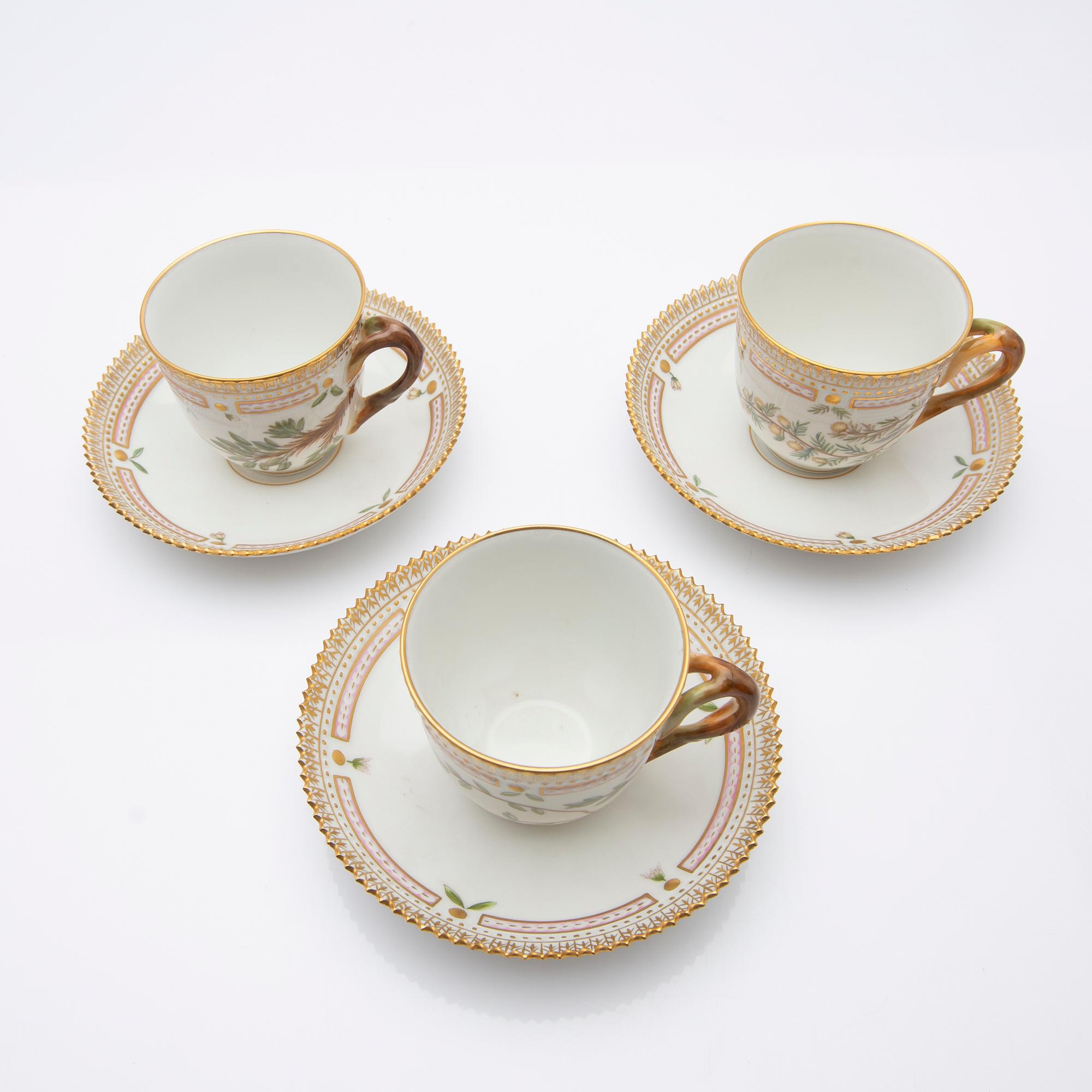 Royal Copenhagen, Coffee cups with saucers, three pieces, porcelain, 'Flora Danica', Royal Copenhagen, Denmark, 20th century.