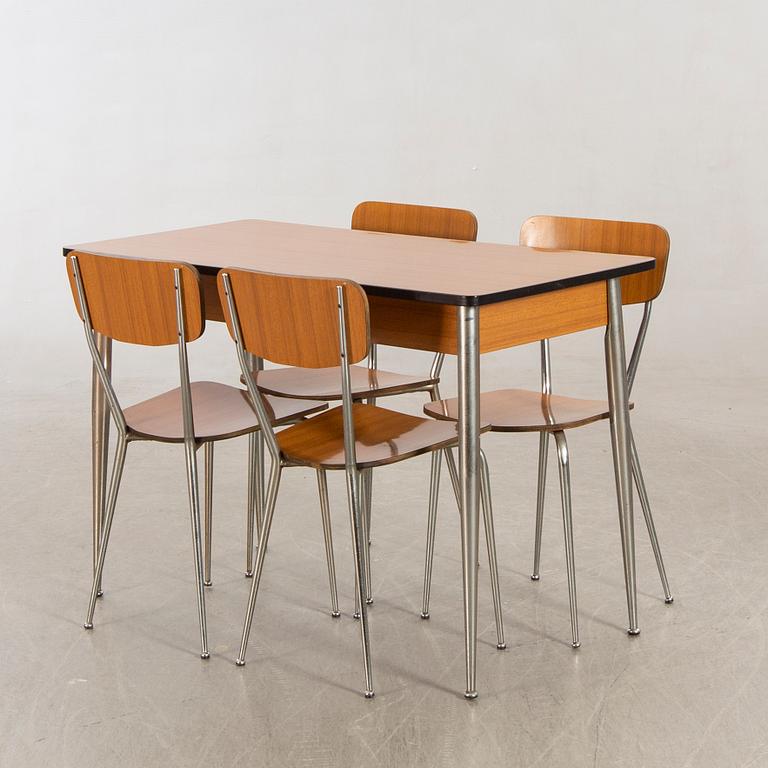 A Salvazini table and four chairs Italy 1950s.