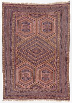 An oriental rug, a. 198 x 130 cm.