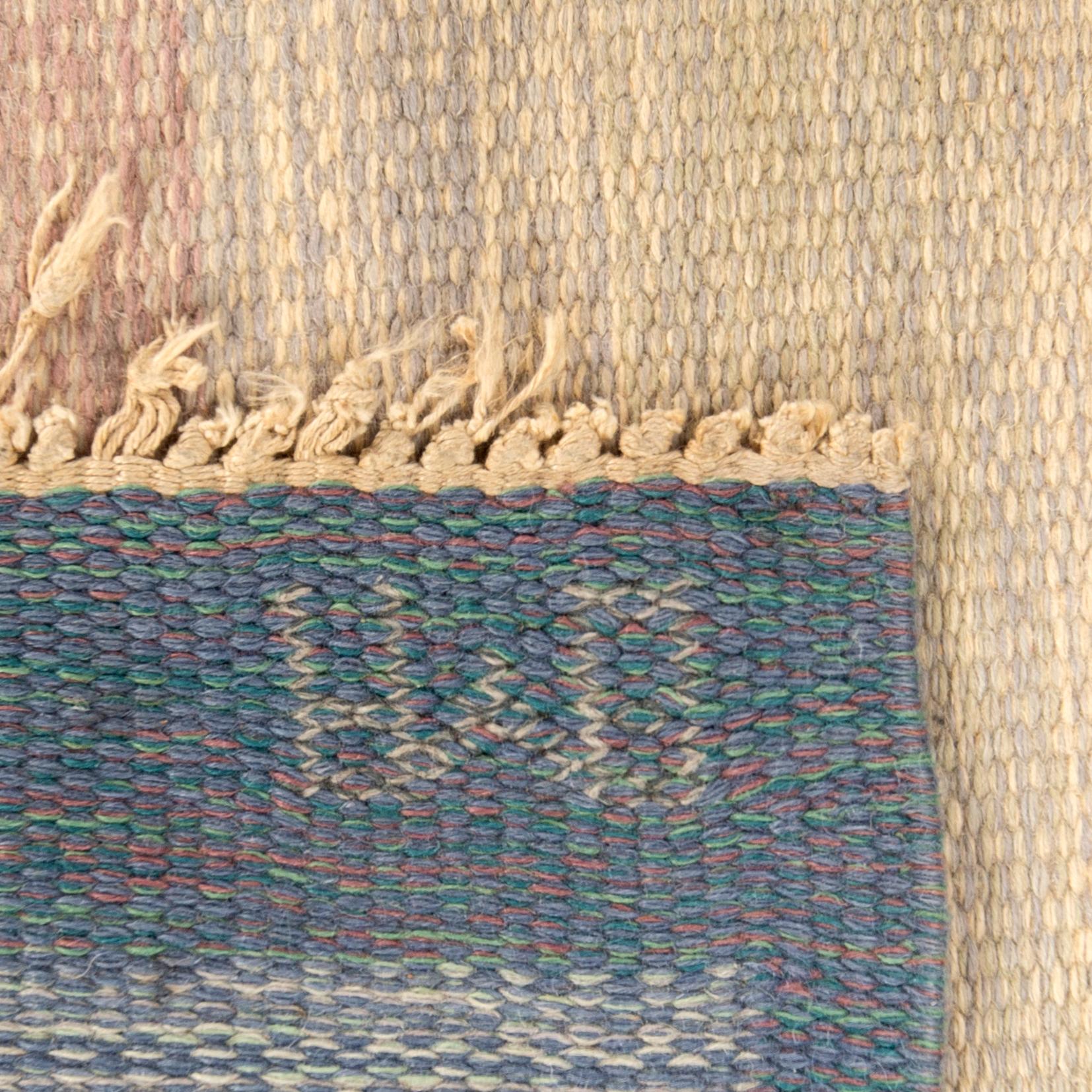 A Swedish falt weave carpet signed 202x138 cm.