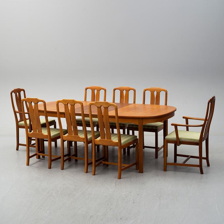 A second half of the 20th century table, two armchairs and six chairs "Ambassadör" by Carl Malmsten.